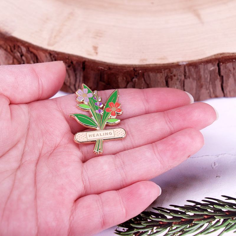دبوس زهرة عشبية مطلي بالمينا ب - مراجعة Herbal Wellness Healthcare وسعره